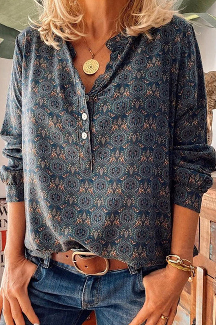 Camicetta da donna con stampa ed elegante scollatura a punta