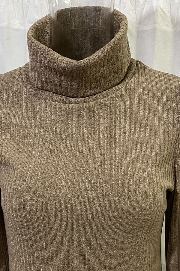 Top lunghi alla moda con colletto elegante per le donne