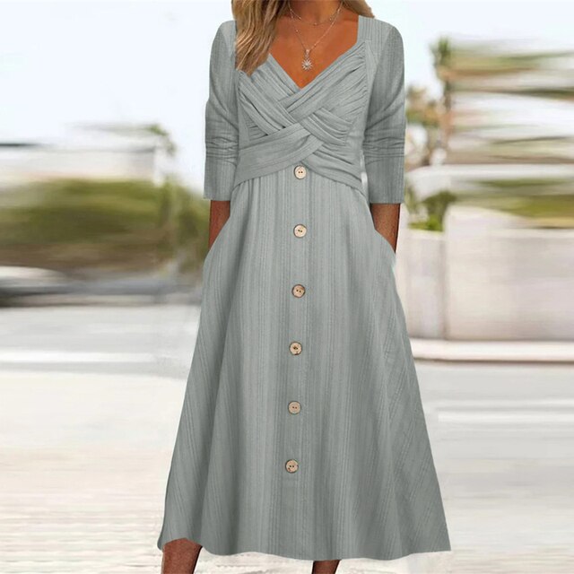 Elegante abito da donna con linea ad A, elegante scollo a V, bottoni decorativi sul davanti e maniche a 3/4
