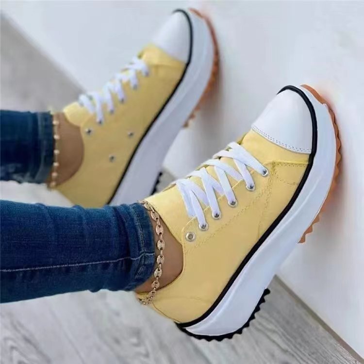 Scarpe da ginnastica con plateau da donna alla moda, con tomaia in morbida tela e suola robusta, ideali per il comfort di tutti i giorni.