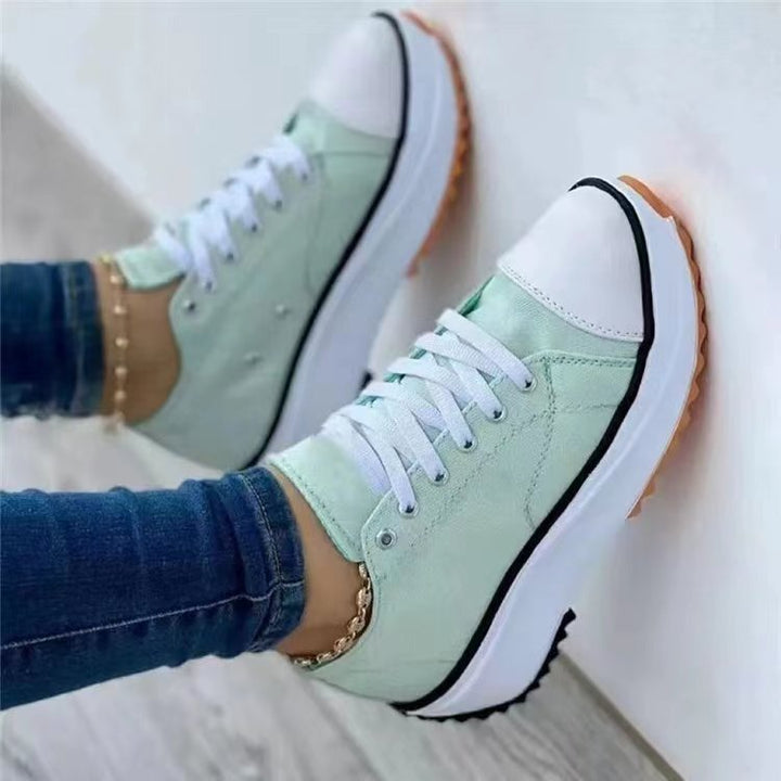 Scarpe da ginnastica con plateau da donna alla moda, con tomaia in morbida tela e suola robusta, ideali per il comfort di tutti i giorni.