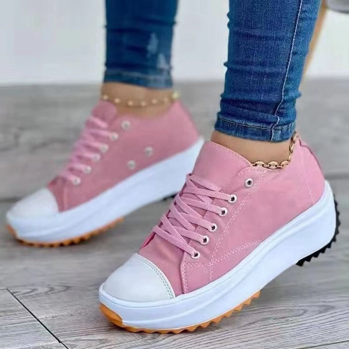 Scarpe da ginnastica con plateau da donna alla moda, con tomaia in morbida tela e suola robusta, ideali per il comfort di tutti i giorni.