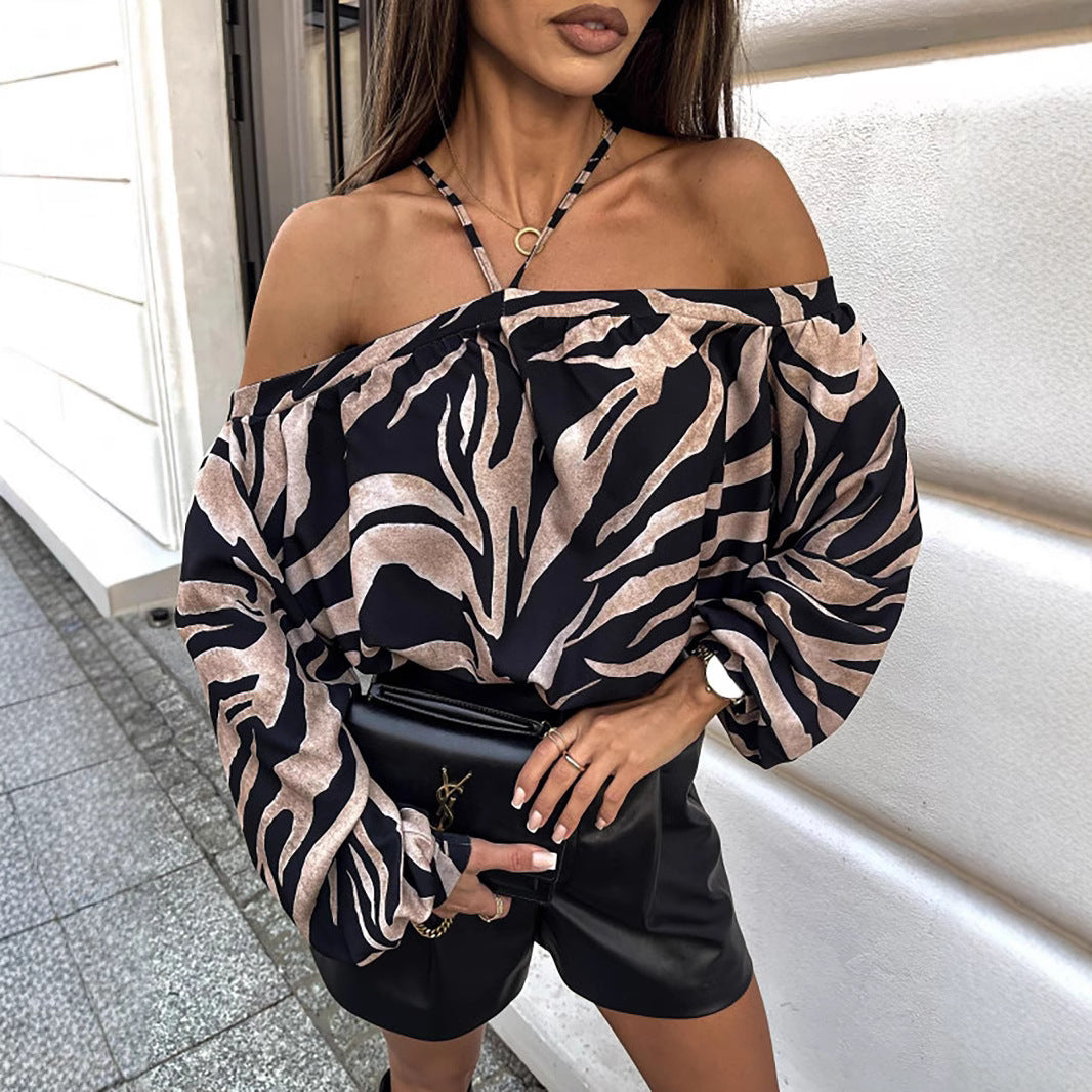 Top da donna alla moda con motivo leopardato, scollo a V, taglio ampio, polsini lunghi e motivo vintage alla moda