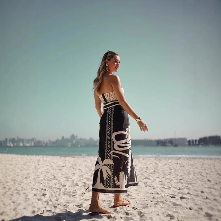 Elegante set da donna con top sbottonato e jeans a manica lunga con un motivo civettuolo, che mette in risalto una silhouette sottile e alla moda