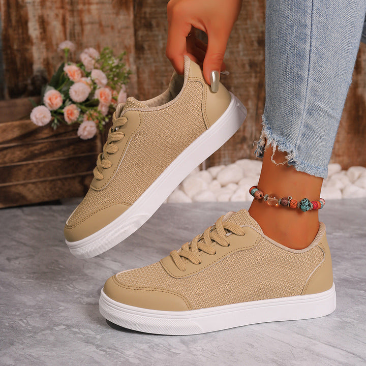 Sneakers da donna in mesh traspirante con elegante allacciatura e comoda suola ammortizzata, ideale per l'uso quotidiano.