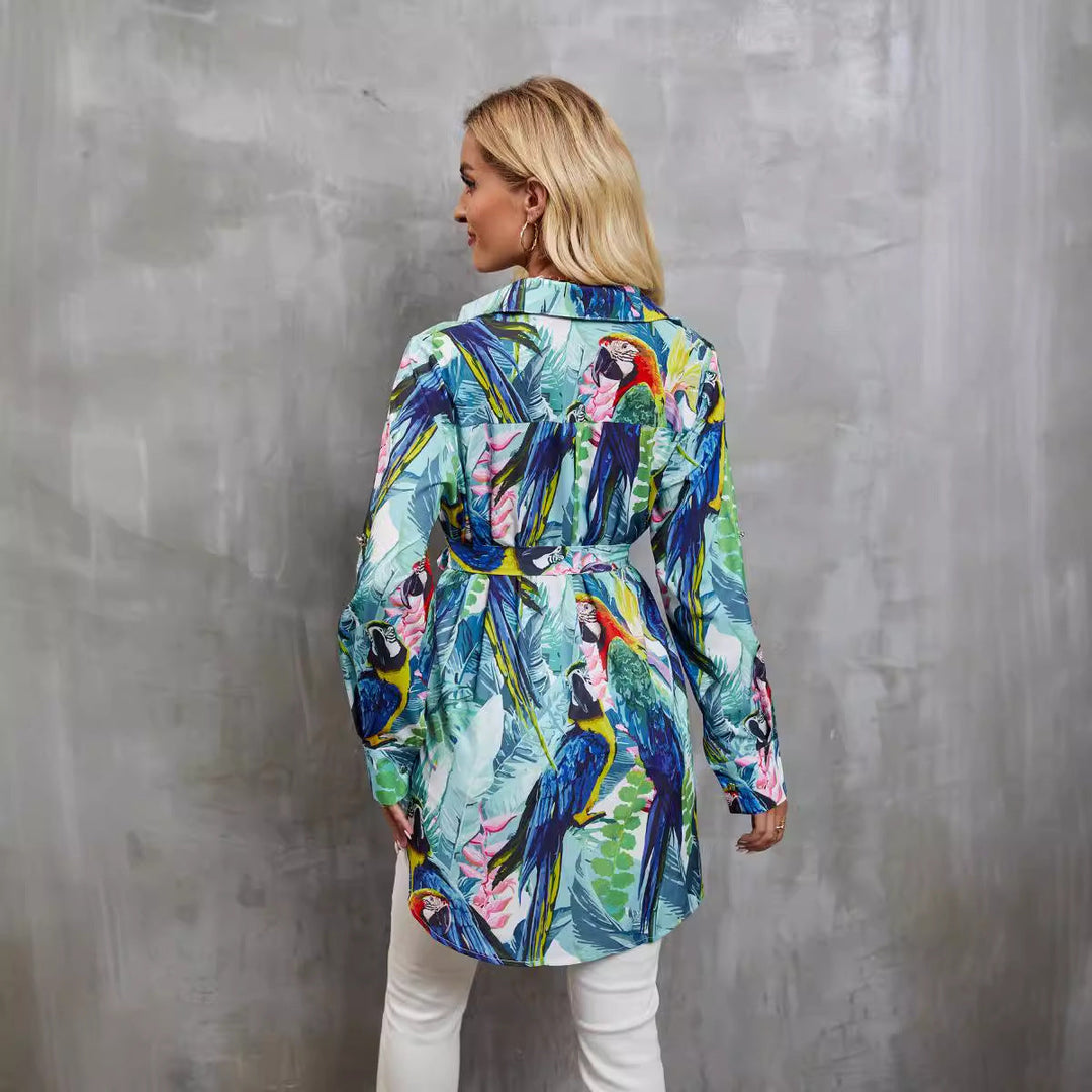 Elegante blusa da donna con maniche lunghe e motivo tropicale - taglio svasato con scollatura a punta