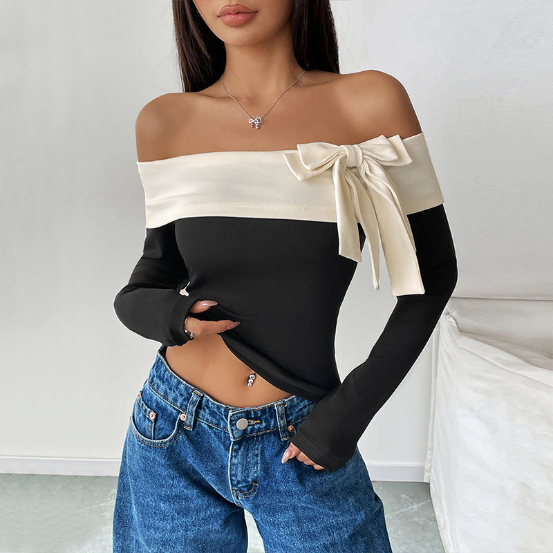 Elegante top da donna con spalle scoperte - aderente ed elasticizzato con un grazioso fiocco
