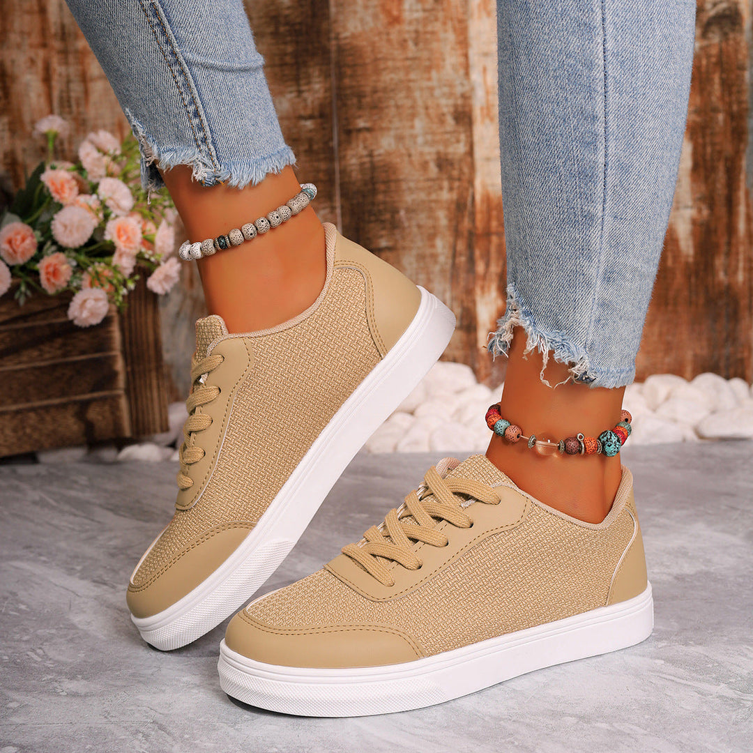 Sneakers da donna in mesh traspirante con elegante allacciatura e comoda suola ammortizzata, ideale per l'uso quotidiano.