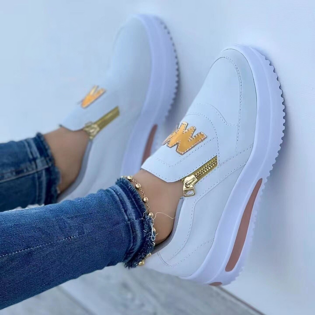 Eleganti sneakers da donna con tomaia in pelle scamosciata, chiusura a zip laterale, suola in gomma spessa e resistente e vestibilità comoda