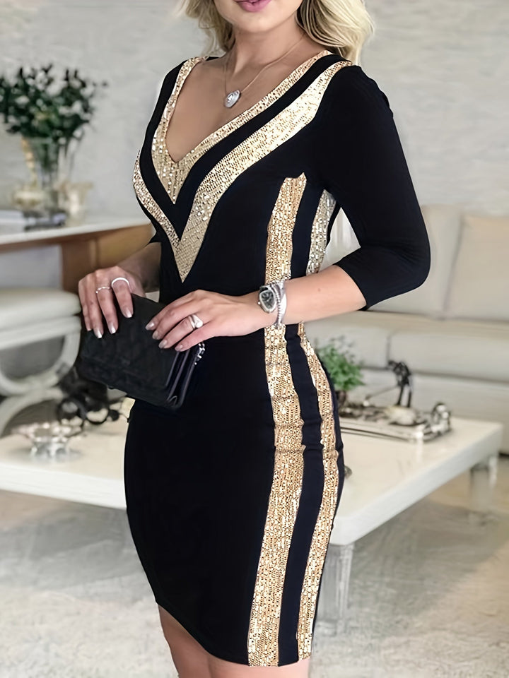 Elegante vestaglia da donna con scollo a V, maniche lunghe e suggestive foglie scintillanti
