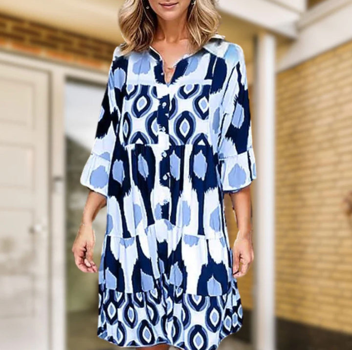 Elegante abito da donna con scollo a V e bottoni sul davanti - taglio casual con maniche di media lunghezza