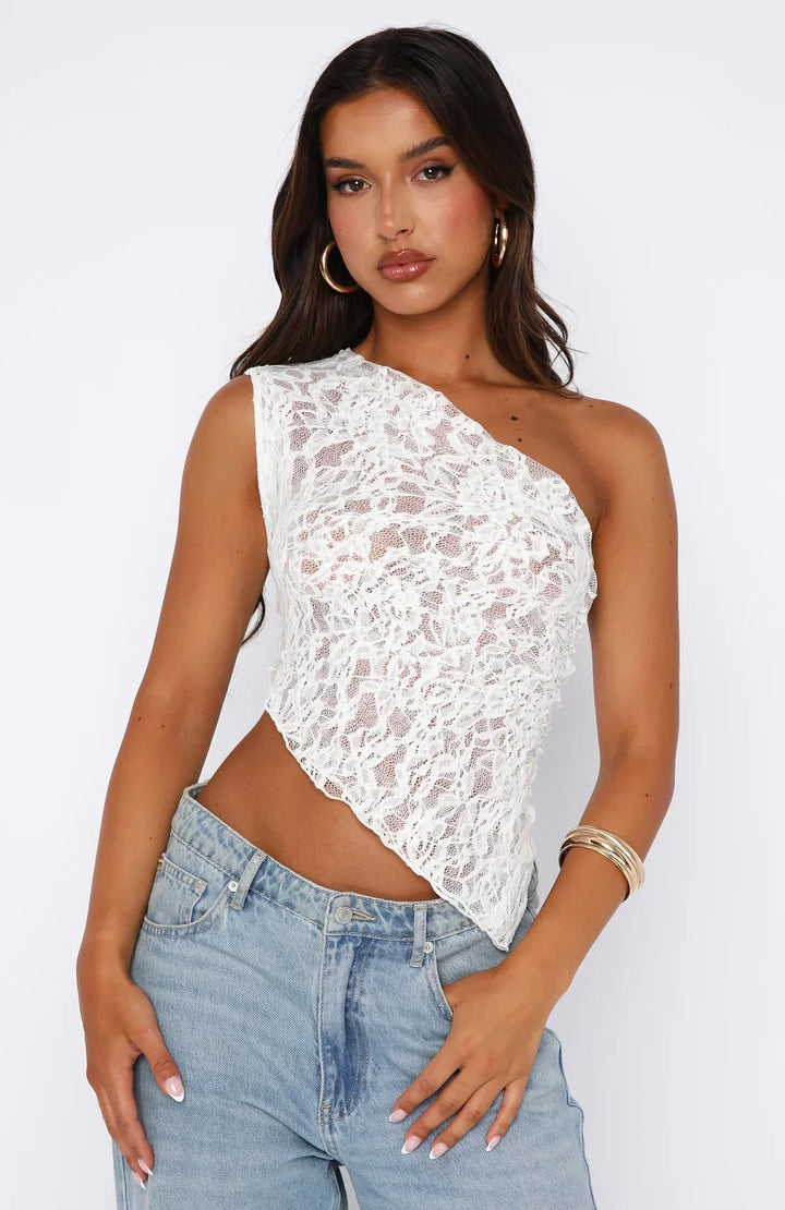 Elegante top monospalla da donna in pizzo con motivo floreale e fondo asimmetrico alla moda