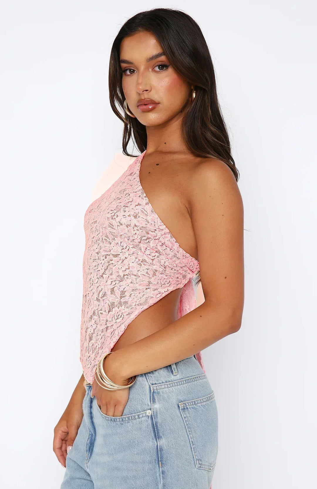 Elegante top monospalla da donna in pizzo con motivo floreale e fondo asimmetrico alla moda