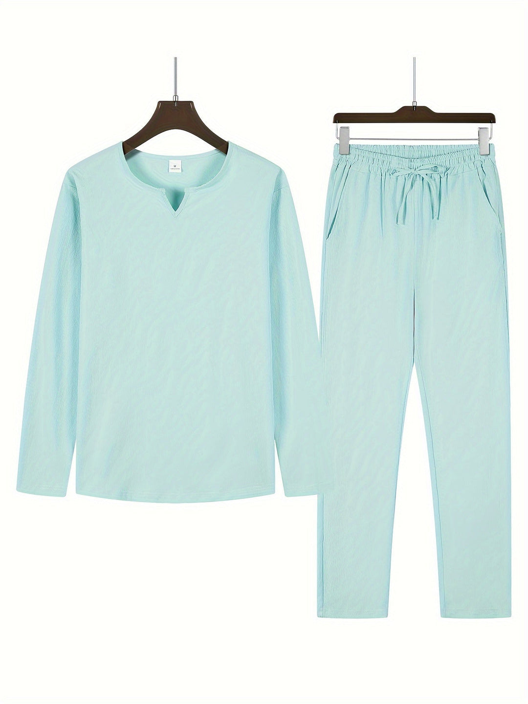 Elegante set da uomo con scollo a punta, polsini lunghi e comodi pantaloni larghi
