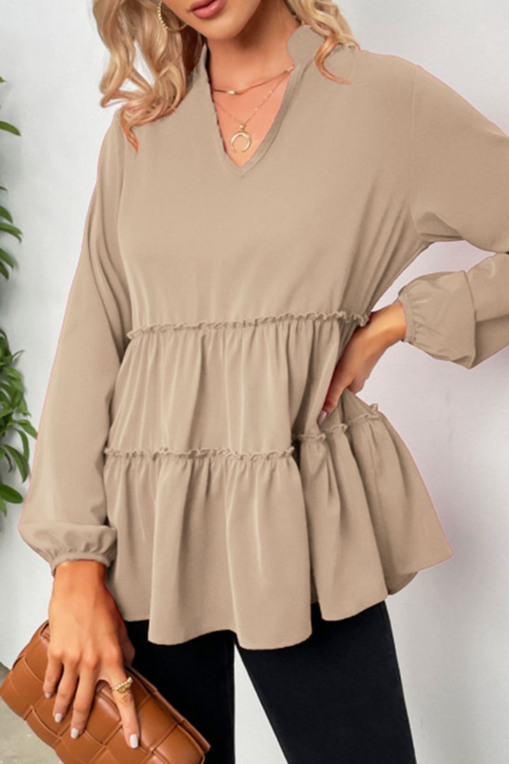 Elegante maglia da donna con scollo a V, seduta confortevole e pratiche maniglie