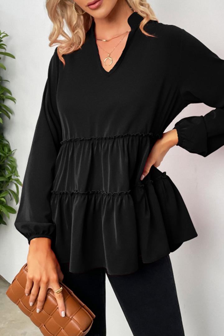 Elegante maglia da donna con scollo a V, seduta confortevole e pratiche maniglie