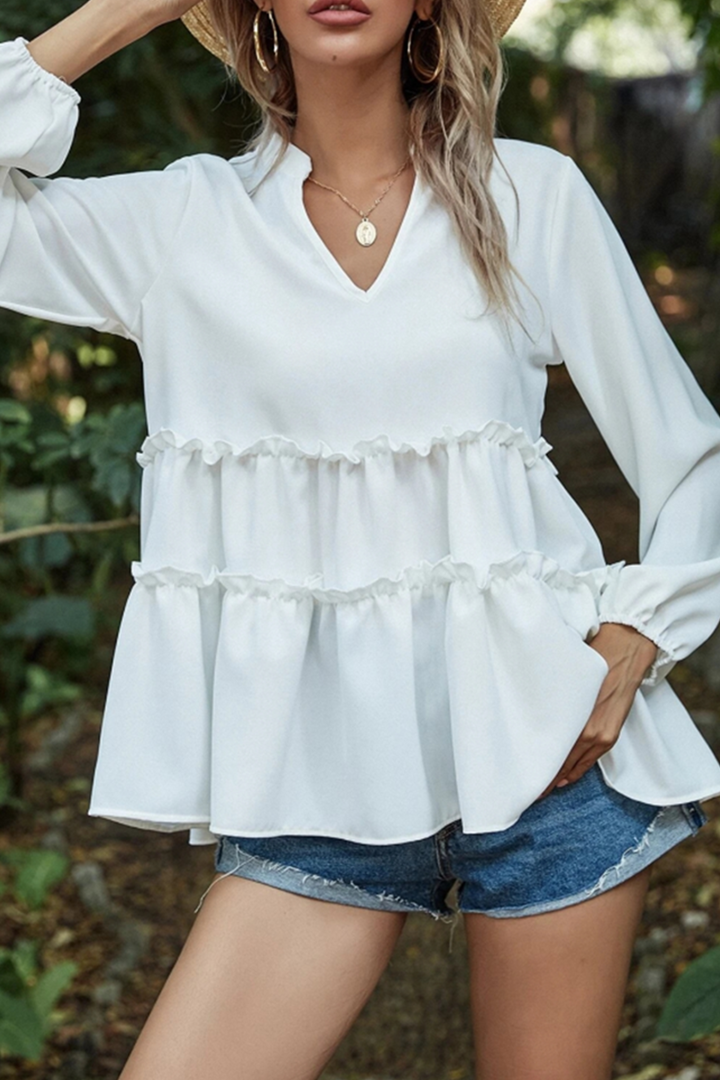 Elegante maglia da donna con scollo a V, seduta confortevole e pratiche maniglie