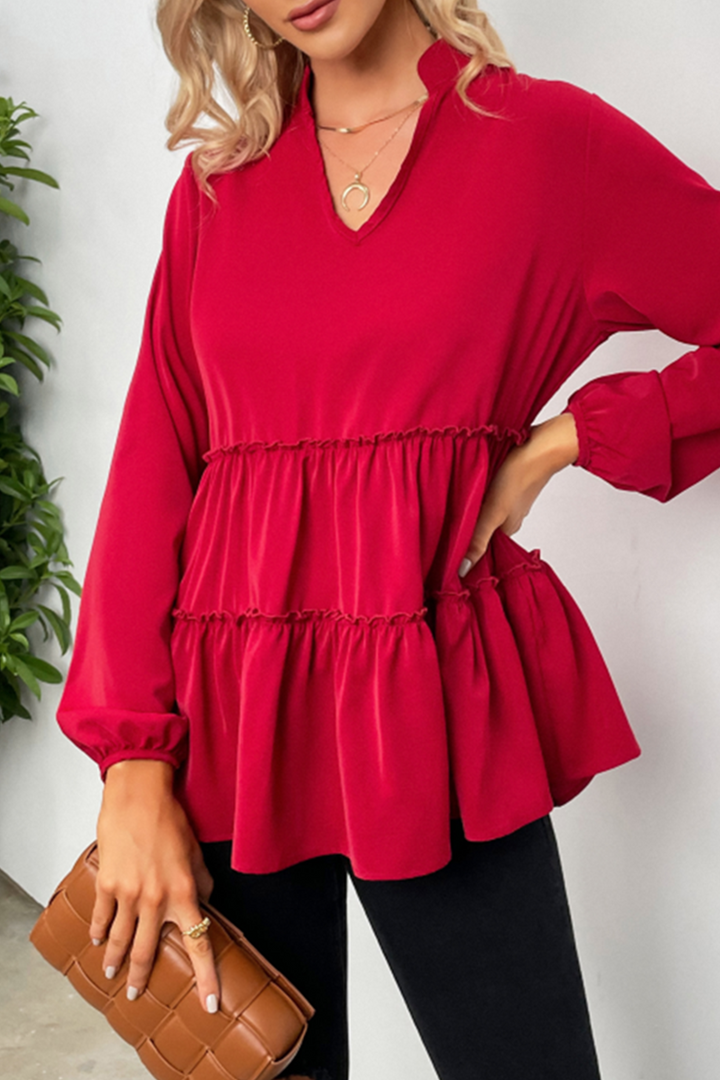 Elegante maglia da donna con scollo a V, seduta confortevole e pratiche maniglie