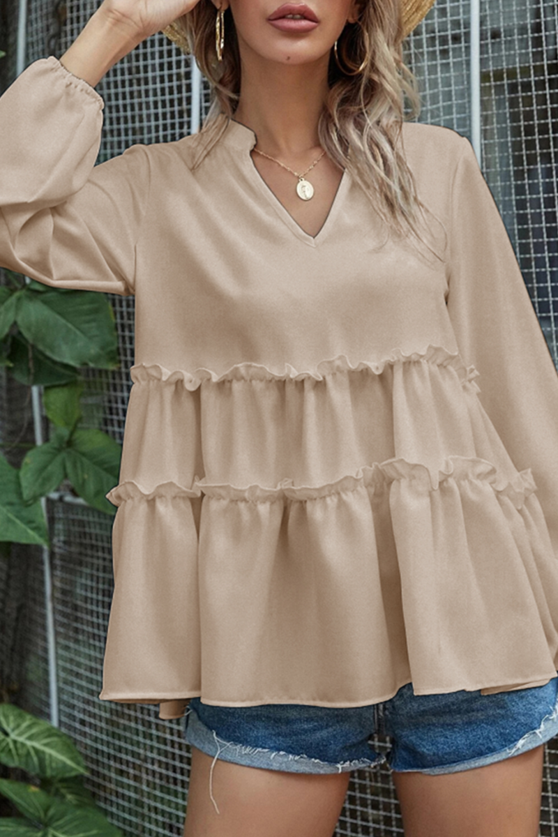 Elegante maglia da donna con scollo a V, seduta confortevole e pratiche maniglie