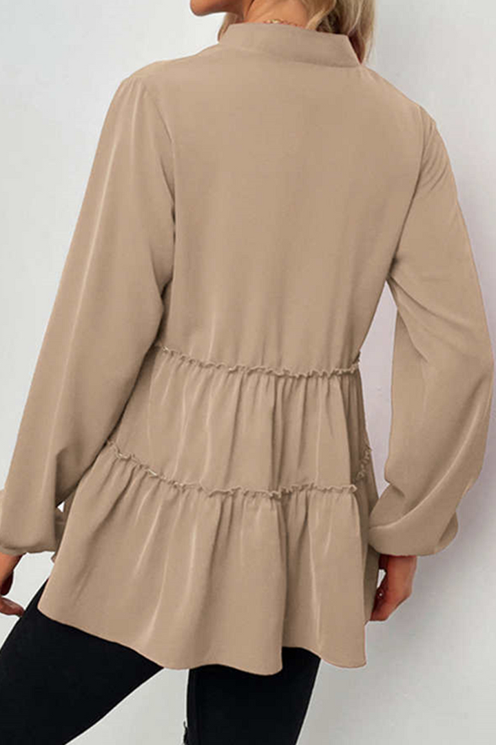 Elegante maglia da donna con scollo a V, seduta confortevole e pratiche maniglie