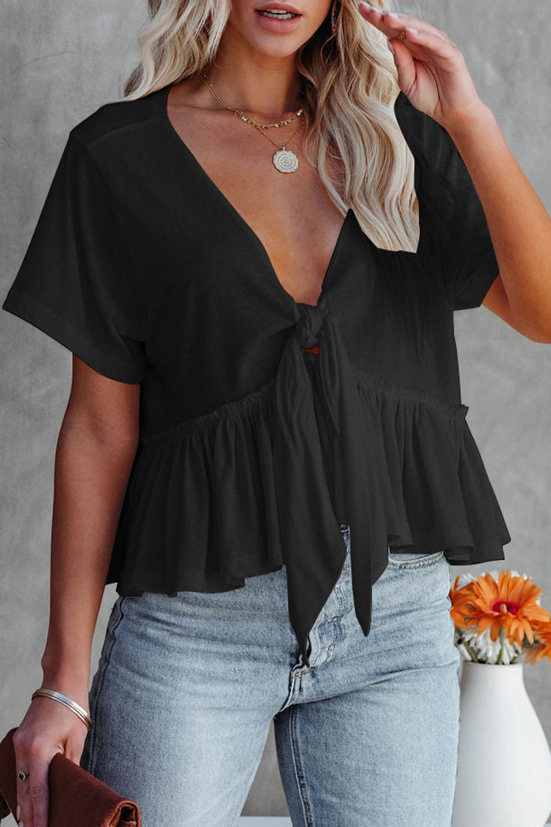 Elegante blusa da donna con profonda scollatura a cuore