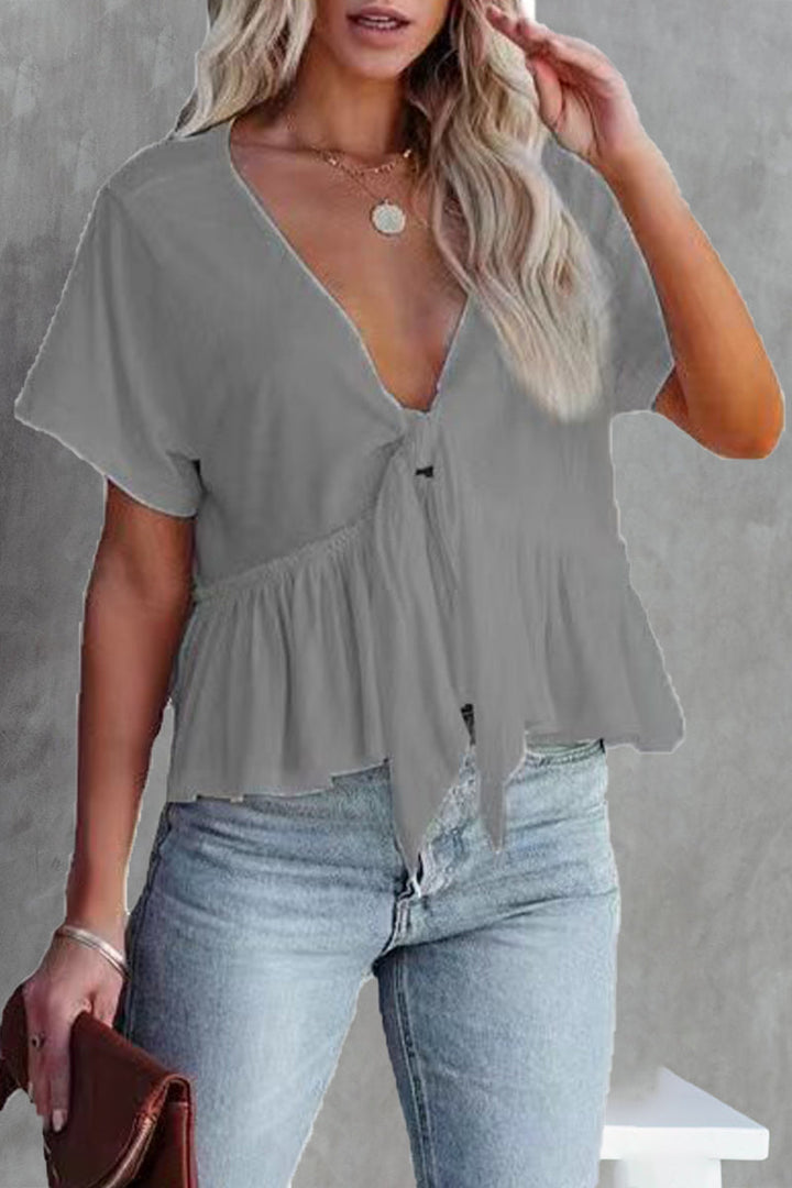 Elegante blusa da donna con profonda scollatura a cuore