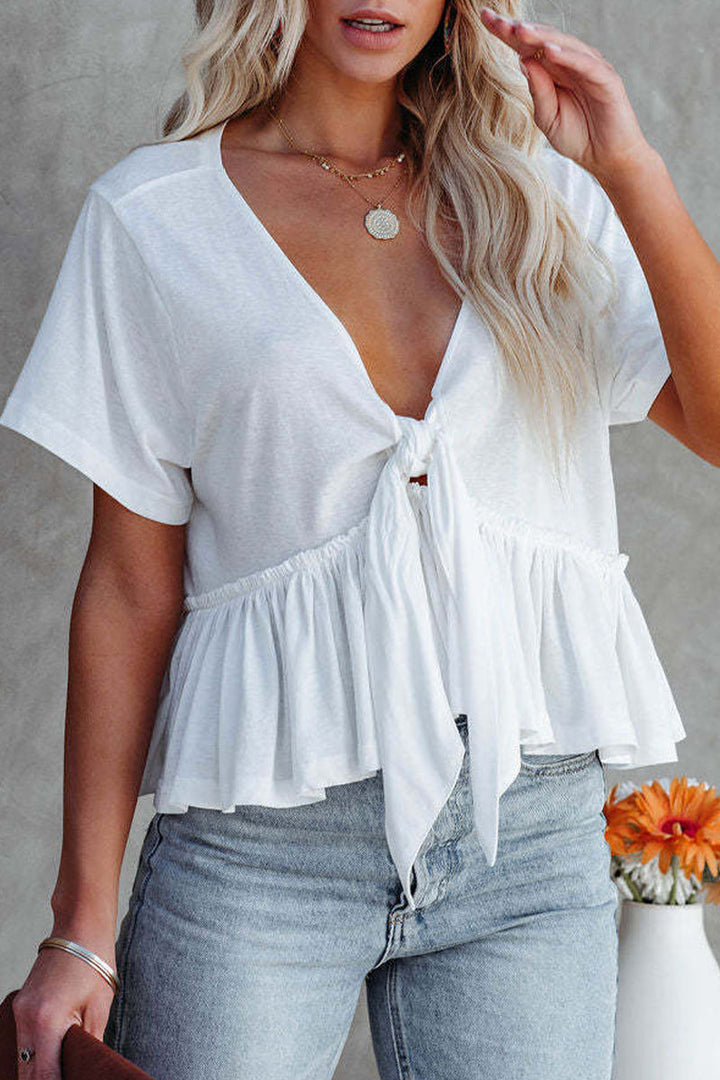 Elegante blusa da donna con profonda scollatura a cuore