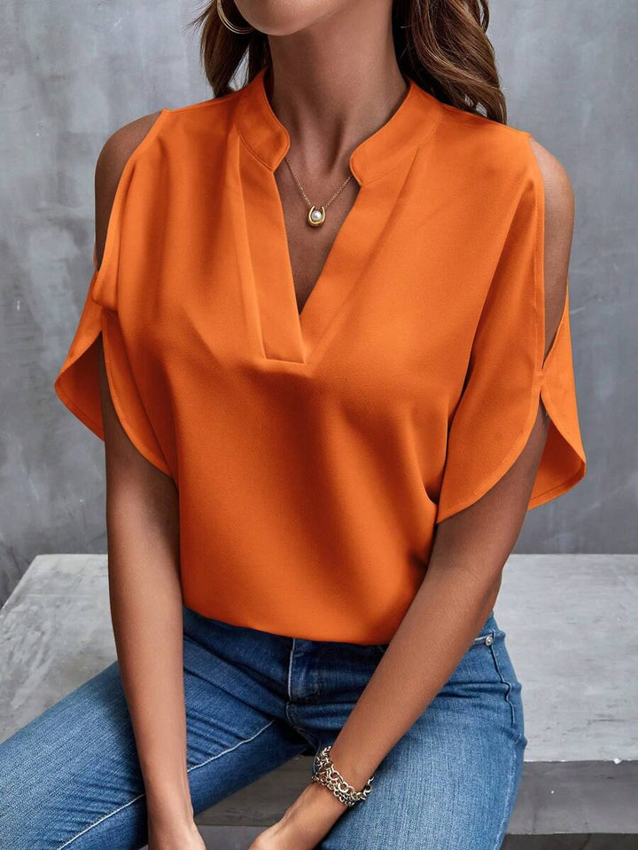 Elegante camicetta con scollo a V e maniche corte svasate alla moda