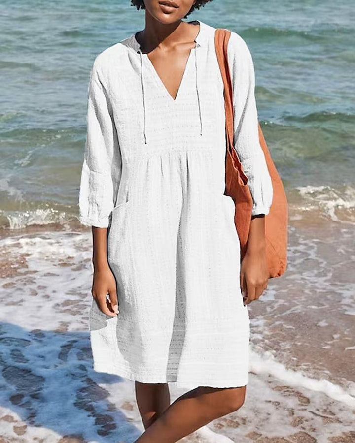 Elegante accappatoio da donna con maniche lunghe e scollatura femminile a punta