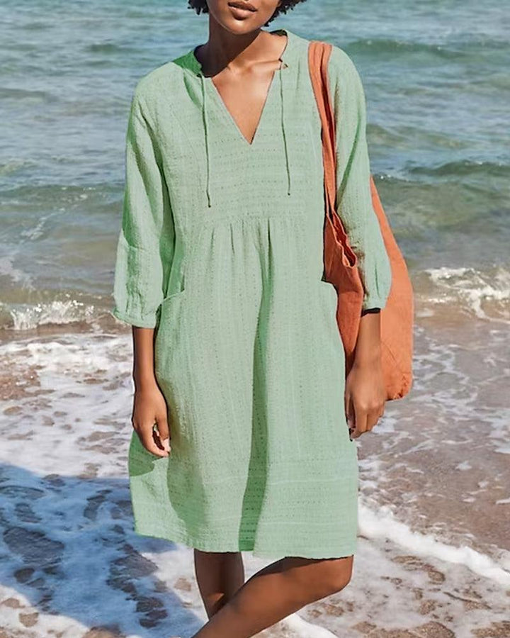 Elegante accappatoio da donna con maniche lunghe e scollatura femminile a punta