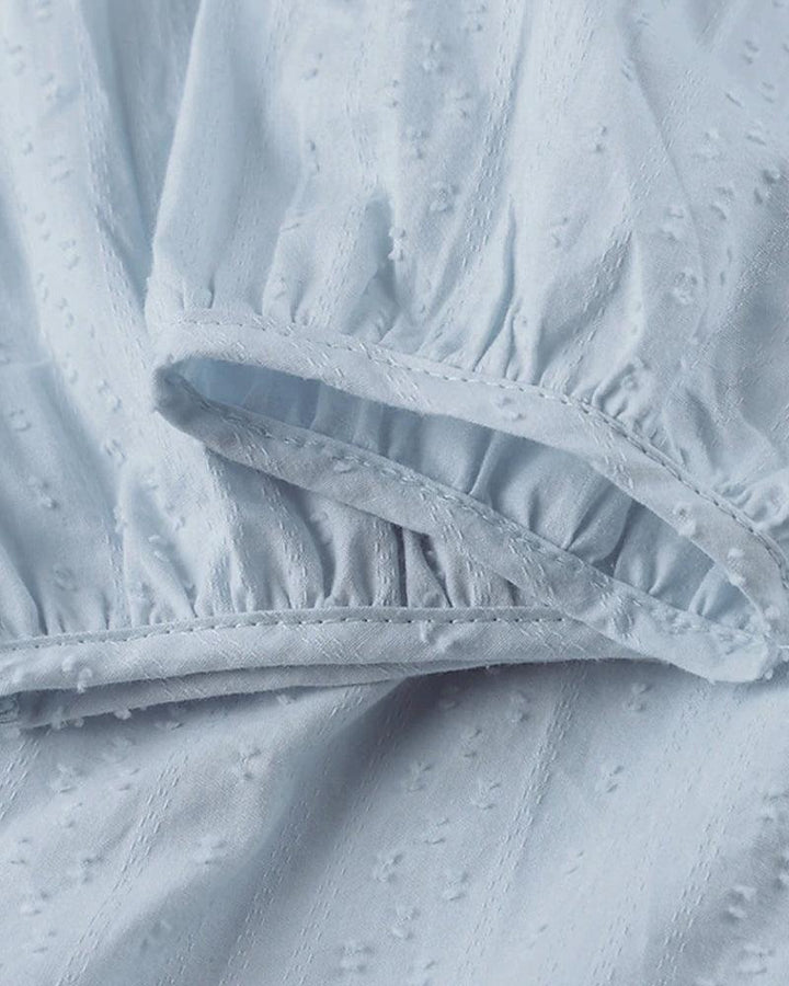 Elegante accappatoio da donna con maniche lunghe e scollatura femminile a punta