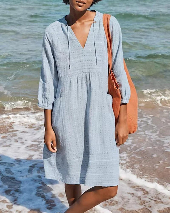 Elegante accappatoio da donna con maniche lunghe e scollatura femminile a punta