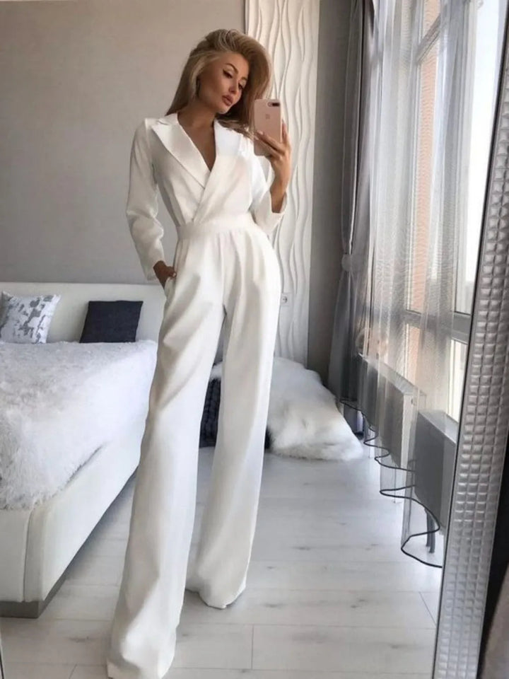Sofia Elegante tuta con scollatura a palloncino e profili larghi: un'opzione elegante e confortevole per le donne
