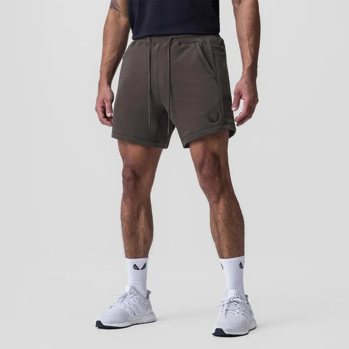 Macho Superiores Shorts para Hombres - Tejido Transpirable, Cintura Elástica, Bolsillos Laterales - Perfectos para Deportistas y Uso Casual