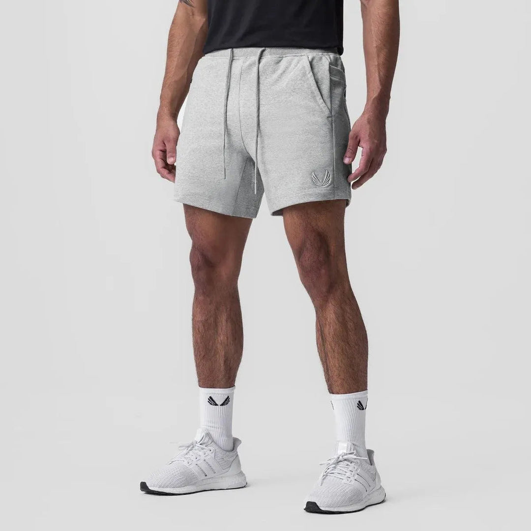 Macho Superiores Shorts para Hombres - Tejido Transpirable, Cintura Elástica, Bolsillos Laterales - Perfectos para Deportistas y Uso Casual