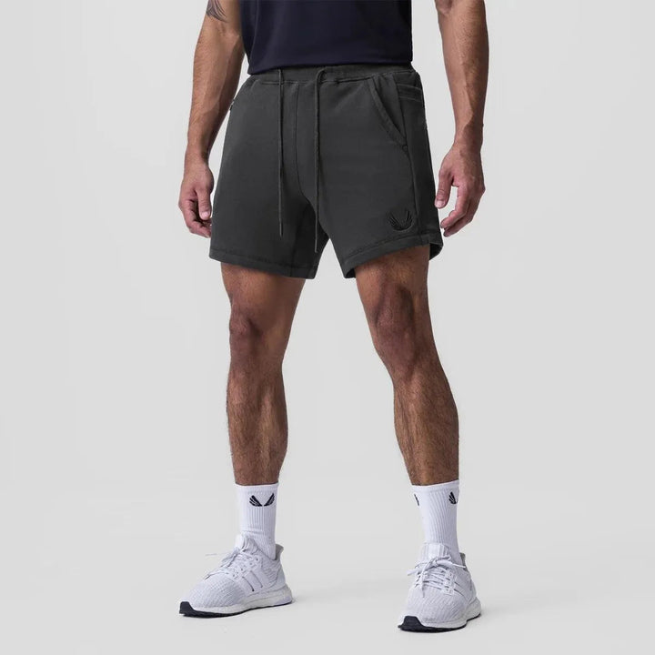 Macho Superiores Shorts para Hombres - Tejido Transpirable, Cintura Elástica, Bolsillos Laterales - Perfectos para Deportistas y Uso Casual