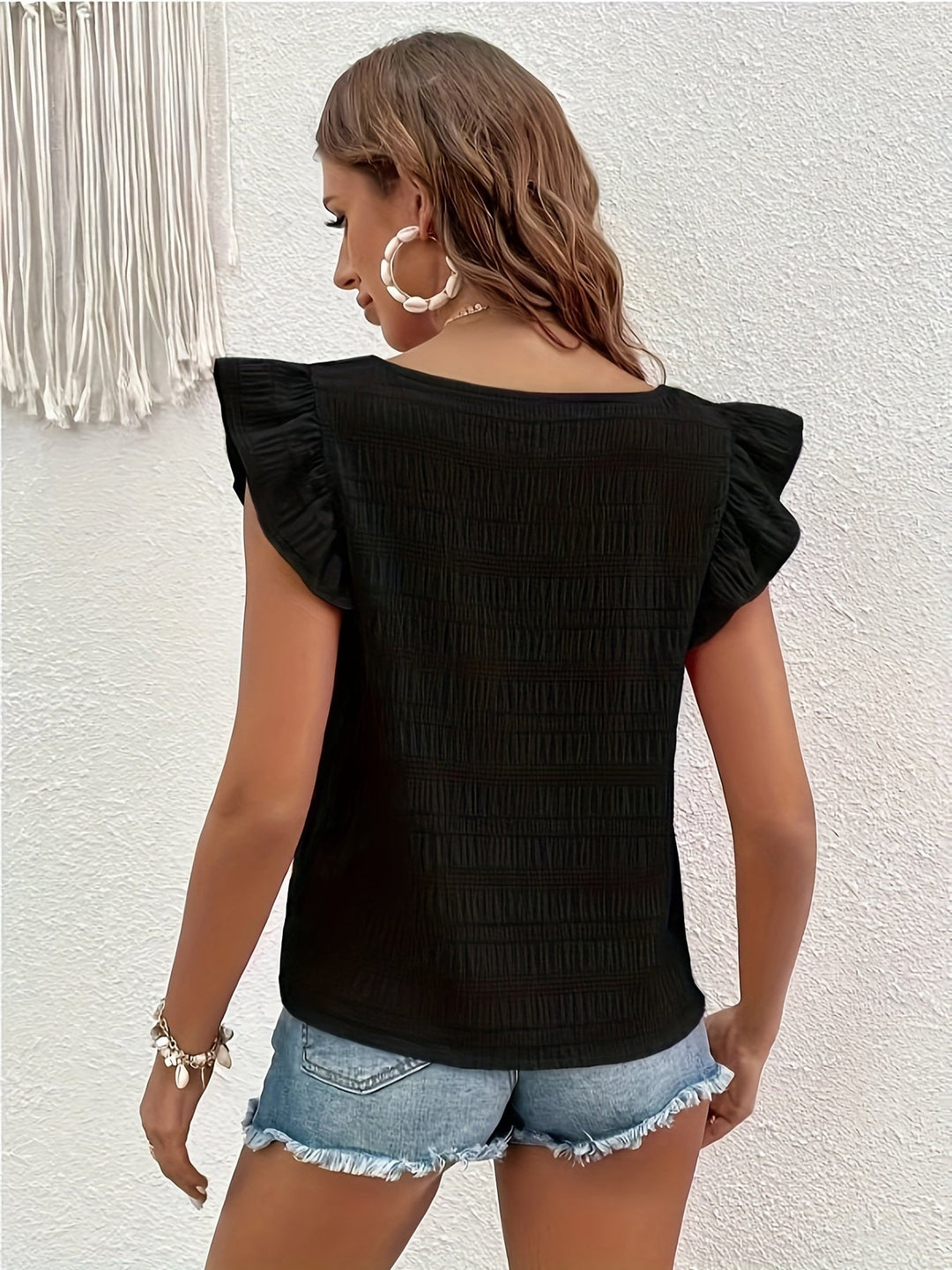 Camicette da donna alla moda con scollo rotondo e mango alla moda per un look elegante