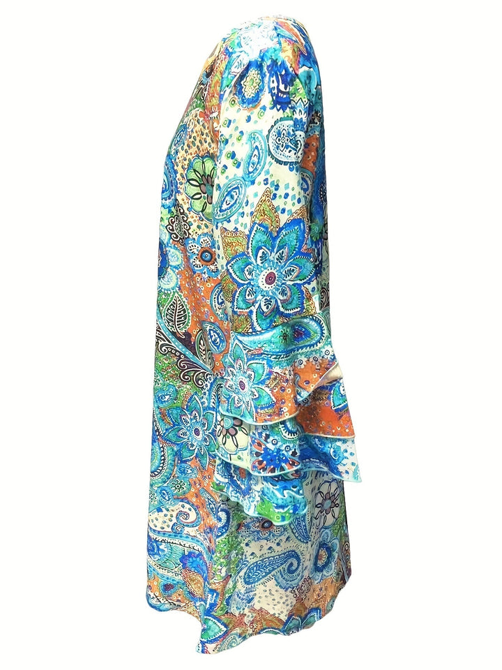 Elegante accappatoio da donna con scollo a punta, polsini lunghi, pratica zip ed elegante motivo paisley bohème