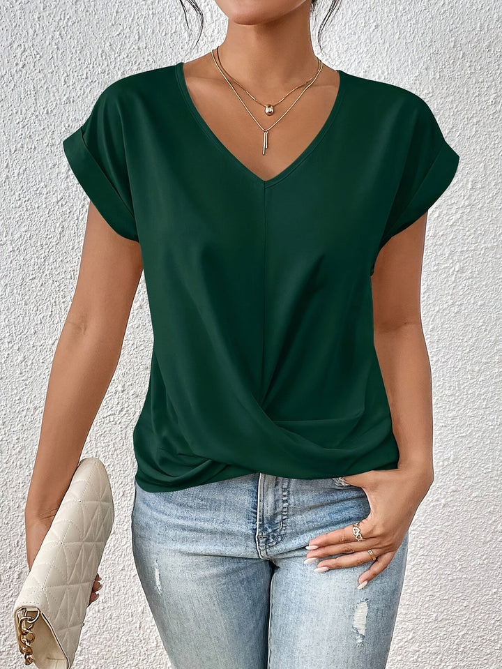 Elegante blusa da donna con scollo a V e sottile drappeggio sul davanti