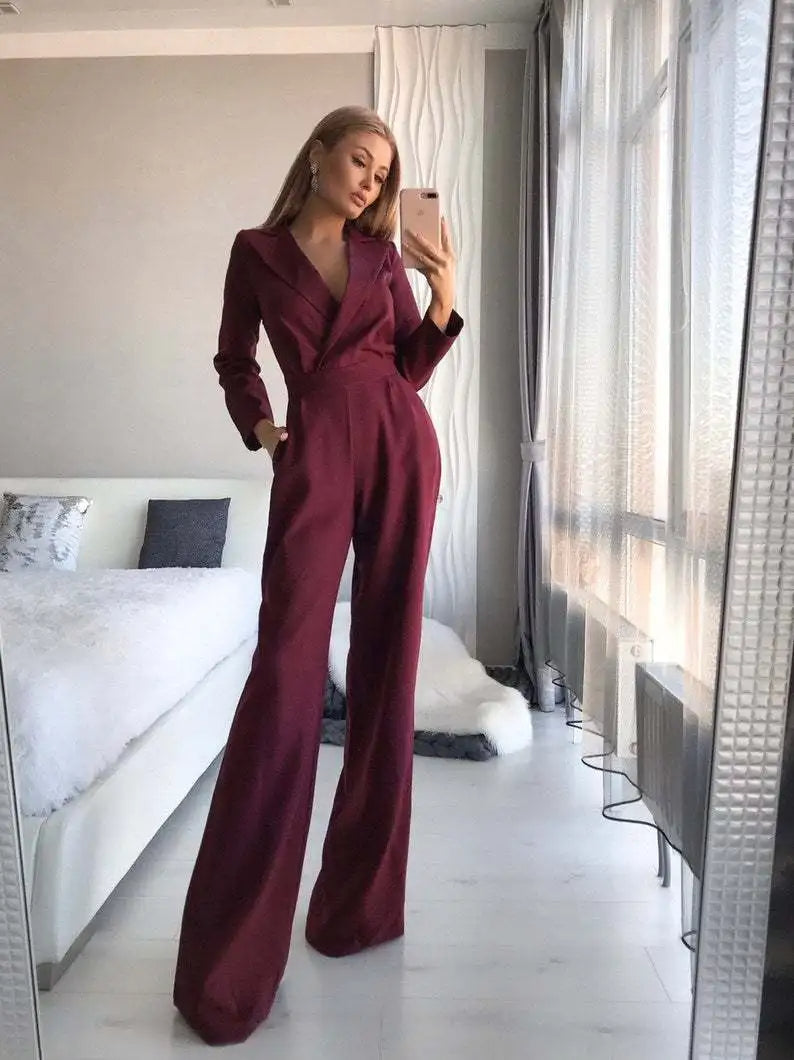 Sofia Elegante tuta con scollatura a palloncino e profili larghi: un'opzione elegante e confortevole per le donne