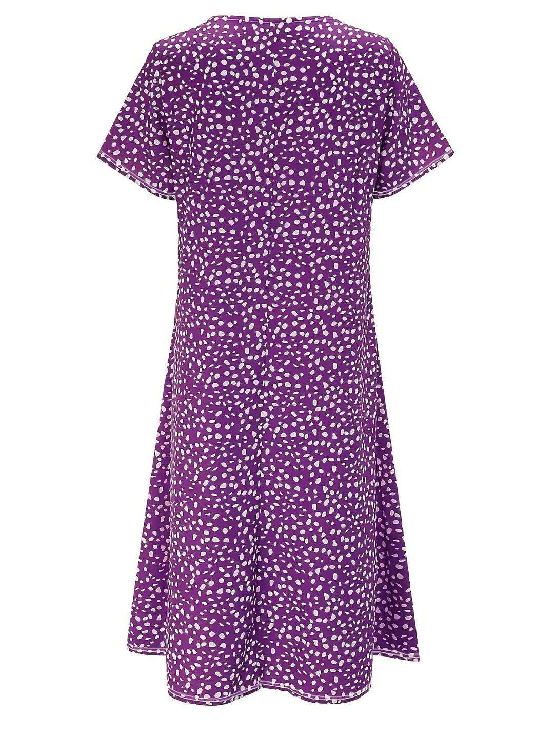 Elegante abito da donna al ginocchio con maniche corte, vestibilità ampia e scollatura arrotondata - un look casual comodo e leggero