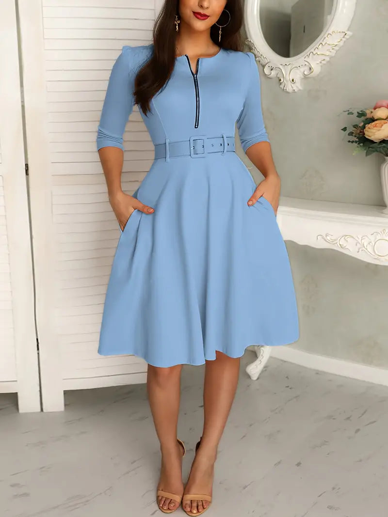 Elegante vestaglia da donna con polsini a tre pezzi, chiusura a zip, taglio aderente, lunghezza al ginocchio e tasche eleganti