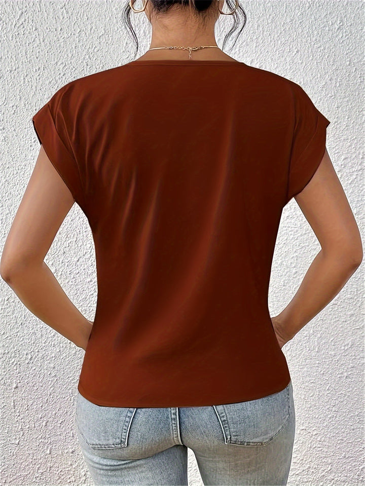 Elegante blusa da donna con scollo a V e sottile drappeggio sul davanti