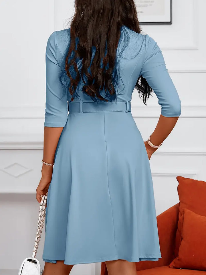 Elegante vestaglia da donna con polsini a tre pezzi, chiusura a zip, taglio aderente, lunghezza al ginocchio e tasche eleganti