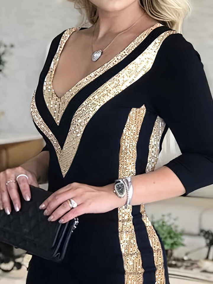 Elegante vestaglia da donna con scollo a V, maniche lunghe e suggestive foglie scintillanti