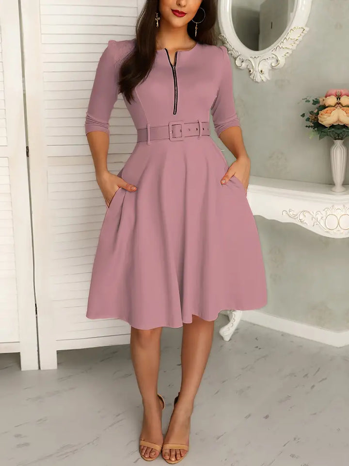 Elegante vestaglia da donna con polsini a tre pezzi, chiusura a zip, taglio aderente, lunghezza al ginocchio e tasche eleganti