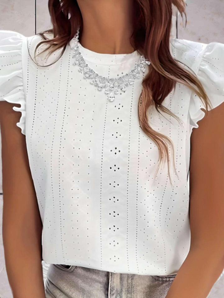 Elegante top voluminoso senza maniche da donna con una scollatura di grande effetto