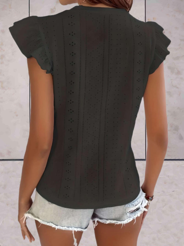 Elegante top voluminoso senza maniche da donna con una scollatura di grande effetto