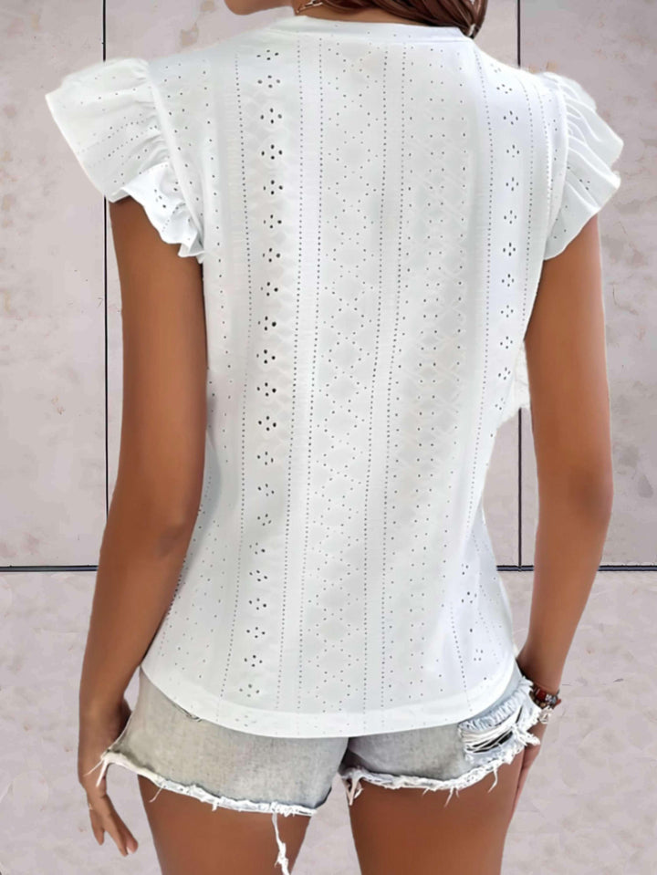 Elegante top voluminoso senza maniche da donna con una scollatura di grande effetto
