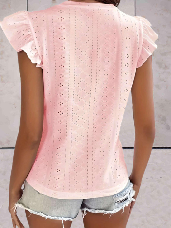 Elegante top voluminoso senza maniche da donna con una scollatura di grande effetto